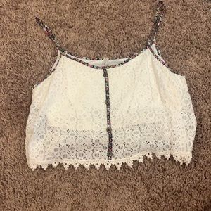 White crop top with black, pink and white flowers